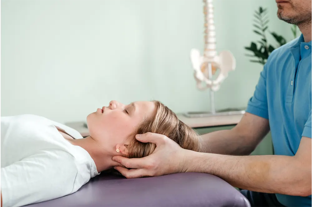 A Girl Receiving Cervical Treatment