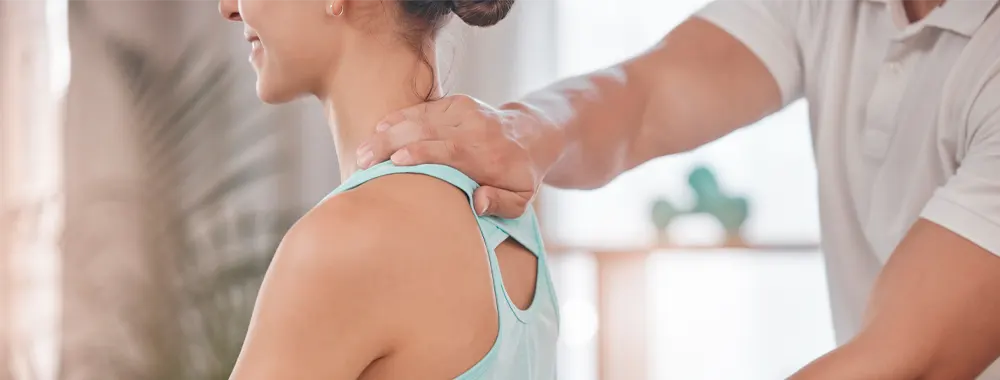 Chiropractor consultation and woman in physical therapy